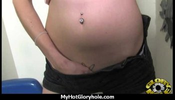 Babe sucks huge black cock at gloryhole